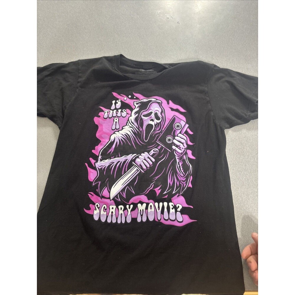 Scream New Adult T-Shirt - Ghostface is This A Scary Movie Purple Image